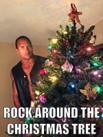 man-rock-áround-christmas-tree.jpeg.jpg